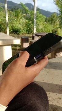 video Woman Hand Scrolling Smartphone Screen with Mobile App and Social Media Concept