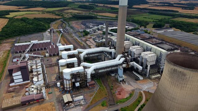 Close up aerial view of the massive flue-gas desulphurisation FGD scrubber unit at a decommissioned power station near Nottingham, UK.