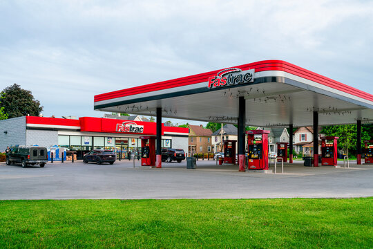 Ilion, NY - May 22, 2026: Dusk exterior view of the FasTrac Markets storefront and fuel canopy located at 68 Central Avenue, Ilion, NY 13357
