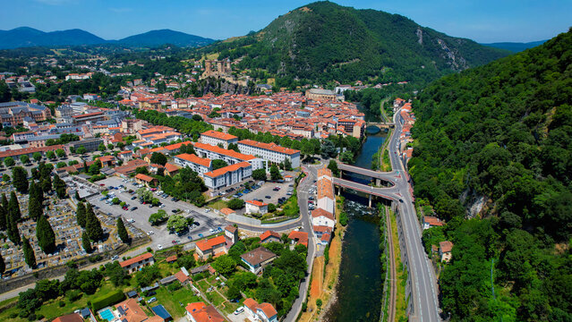 Aerial view of the old town above the city Foix in France, on a sunny spring afternoon.