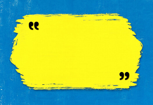 Abstract yellow brush stroke on blue textured background with quotation marks for quote template and design.