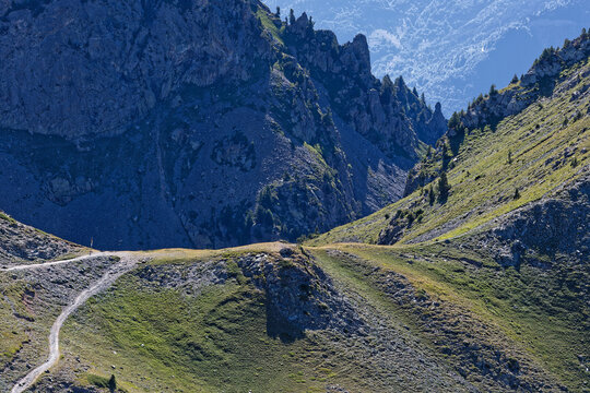 Paths crossing at a mountain pass in Belledonne mountain range