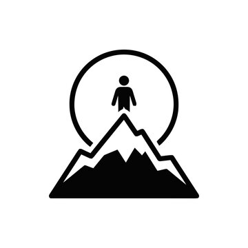 Silhouette of person standing on mountain peak, achieving goal, success, victory symbol