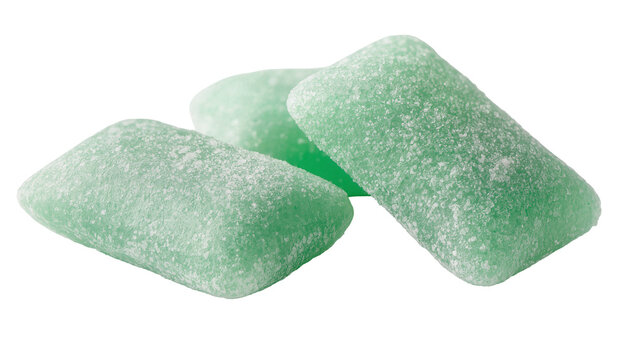 Three pastel green sugar-coated gum pieces, isolated on transparent background
