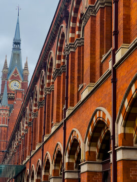 Historic facade of St Pancras International with its iconic clock tower, Victorian Gothic architecture, famous London railway station, Eurostar gateway and British travel landmark