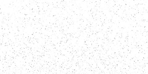 Fototapeta premium Abstract speckle background with scattered grey dots and white textured surface