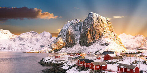 beautiful view at the mountains at sunrise in the lofoten islands, a beautiful winter sunset, a popular tourist destination in norway, europe © Baki