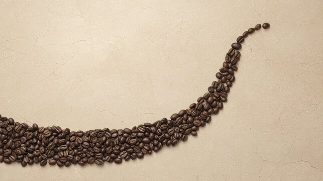 Long curved arrangement of roasted coffee beans on beige textured surface with space for text or design, minimalistic top view coffee bean layout