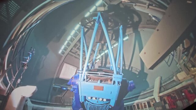 Large professional astronomical telescope inside an observatory dome, modern space exploration equipment