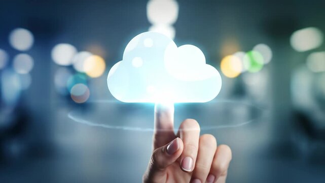 Close-up of a finger touching a virtual glowing cloud computing icon on a digital interface screen with bokeh background