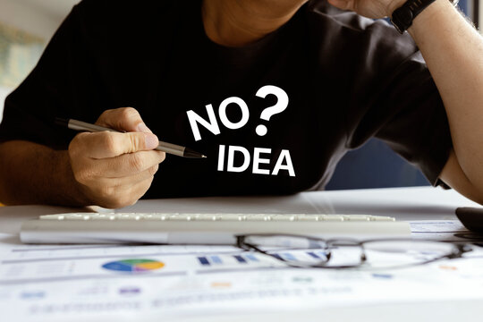 Business Professional Struggling with No Idea Concept at Office Desk