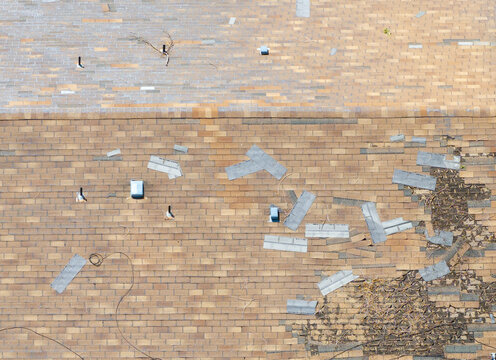 Aerial shot captures storm-damaged roof