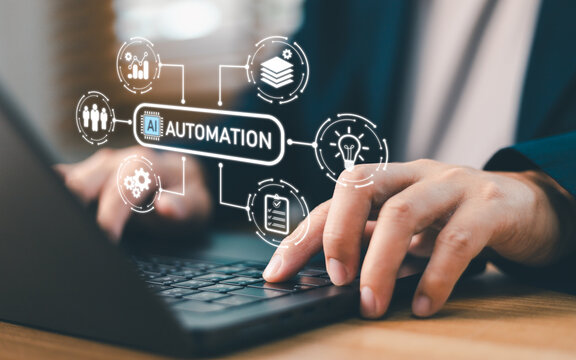 Businessperson typing on laptop with AI automation virtual dashboard. Business process optimization concept with artificial intelligence interface for software workflow