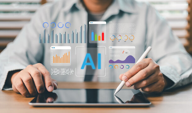 Businessperson using tablet and stylus to analyze financial data charts with AI holographic interface. Futuristic artificial intelligence tech for business analytics and marketing growth