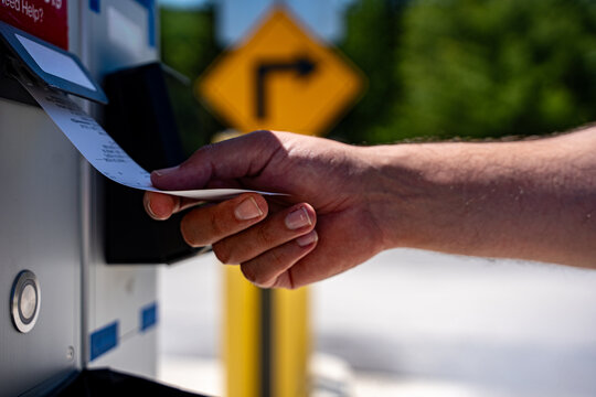 Close up of parking ticket receipt from machine.