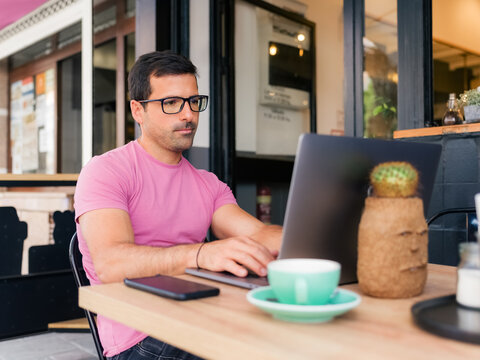 Relaxed freelancer working at cafe 