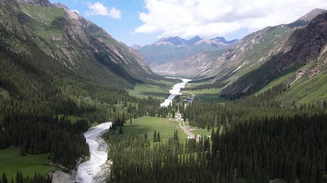Aerial View of Forest, Snow Mountains, Grassland, and Valley at Xia Ta, Yili, Xinjiang, China