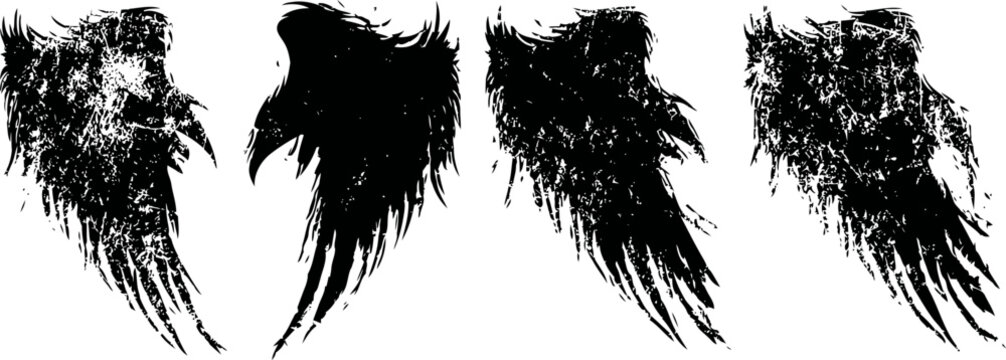 Grunge black wings silhouettes set rough ink feather shapes isolated on white