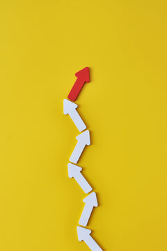 Leading through change with red arrow guiding business direction