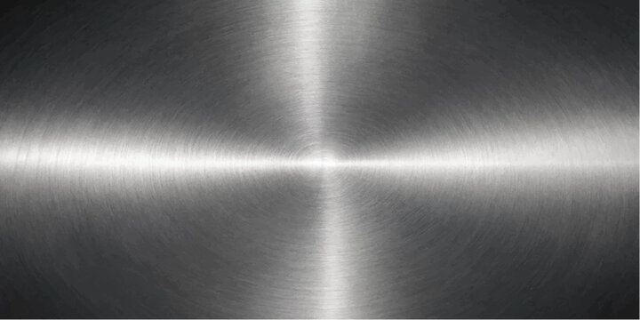 Polished metallic surface with radial brushed texture and bright reflection, suggesting industrial material or futuristic design.