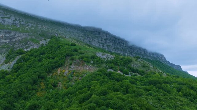 Aerial drone view of the spring landscape around the Lizarraga and San Donato mountain passes in the Sierra de Urbasa Natural Park. Navarre, Spain. Europe