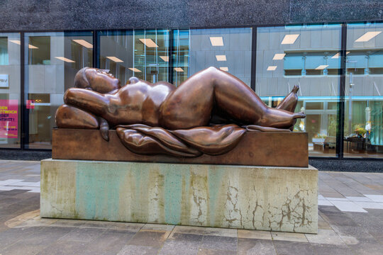 Famous monumental bronze sculpture Reclining Woman by Colombian artist Fernando Botero in the city center of Vaduz, Liechtenstein