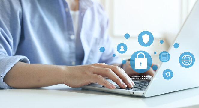 close up  man hand use laptop to access account on website with virtual icon of cybersecurity system and confidential concept