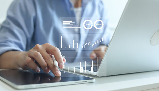 close up on businessman manager hand check  on digital tablet with virtual financial chart dashboard for following and read about report or data  from company concept