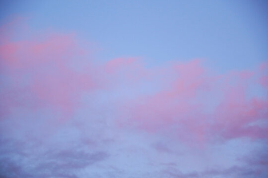 pastel winter sky with pink and purple clouds