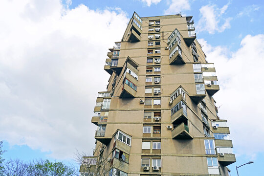 Facade of Karaburma Residential Housing Tower known as Toblerone with zigzag balconies. Presents iconic Yugoslav architecture, experimental structural engineering, and innovative building design.
