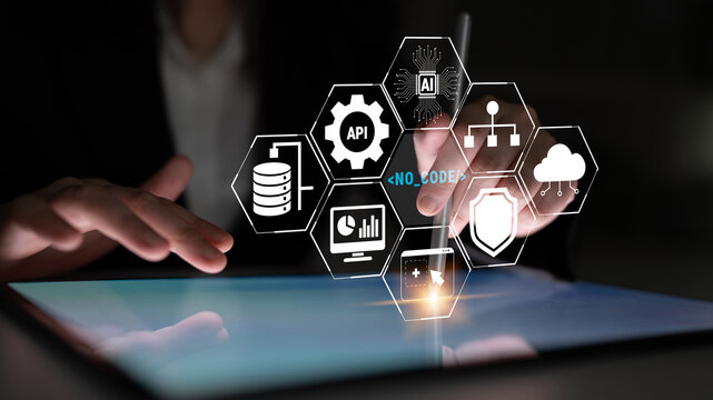 Business Professional Using Touchscreen Device to Interact with Digital Interface Representing Technology Concepts and Data Analysis Tools Quark.