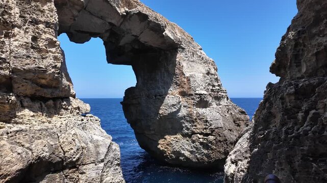Wied il Mielah, Gharb, Gozo - Natural arch on the north-western coast of the island of Gozo in Malta, alternative for collapsed Azure window. High quality 4k footage