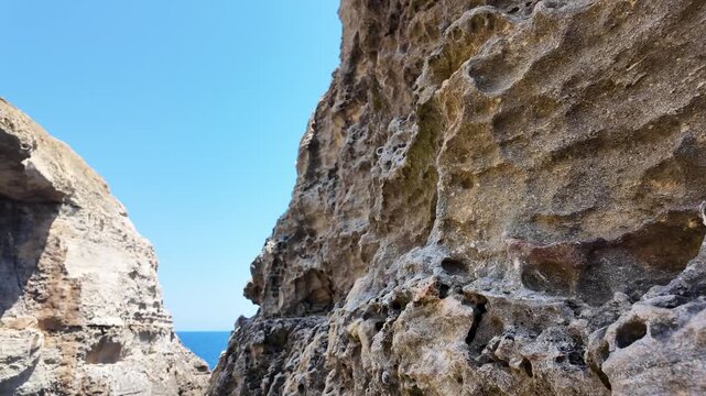 Wied il Mielah, Gharb, Gozo - Natural arch on the north-western coast of the island of Gozo in Malta, alternative for collapsed Azure window. High quality 4k footage