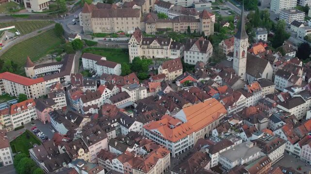 Aerial panoramic view above the old town around the city Chur in Switzerland on a sunny summer afternoon. 