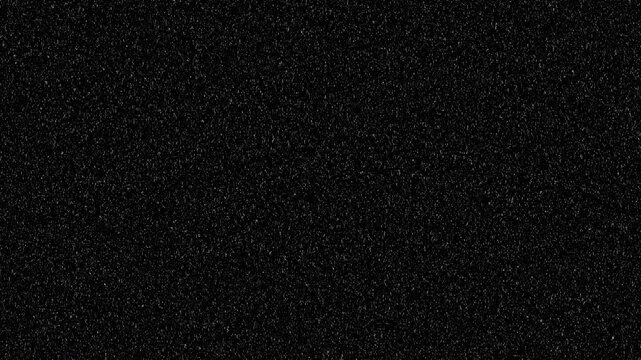 Abstract dark background with grainy film noise texture and small white dust particles