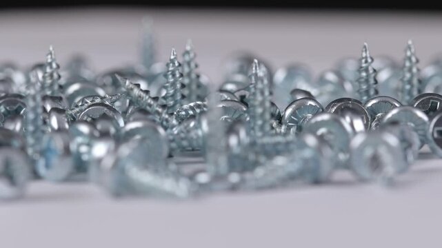 Metal mounting screws close-up. Macro image.