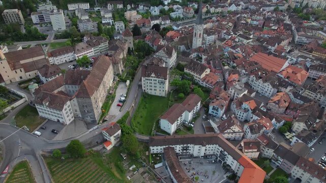 Aerial panoramic view above the old town around the city Chur in Switzerland on a sunny summer afternoon. 