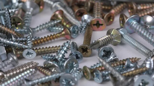 Metal mounting screws close-up. Macro image.