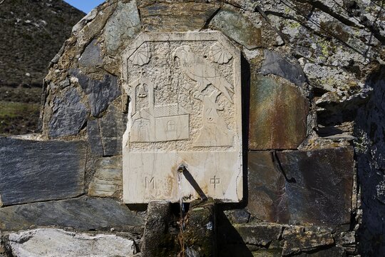 Engraved stone tablet with religious symbols, set into a rock, Chapel of Agios Ioannis Prodromos, Sembronas, Lefka Ori, White Mountains, mountain massif, west, Crete, Greece