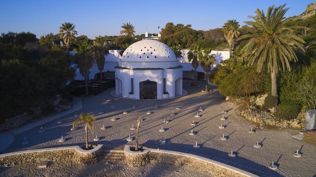 Drone shot, morning light, white dome on paved square, surrounded by palm trees in Mediterranean landscape, Kalithea, Kallithea, thermal baths, thermal baths, bathing complex, Rhodes, Dodecanese, Greek Islands, Greece