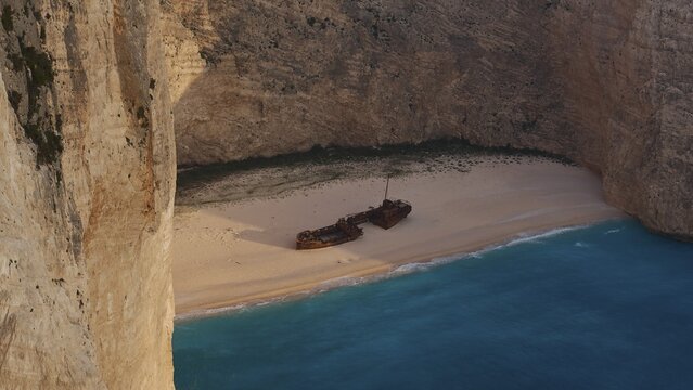 Paralia Navagio, Shipwreck Beach, Shipwreck MV Panagiotis, beach close, rocky cliff, winter, cloudy sky, deserted beach, blue and turquoise crystal clear sea, Zakynthos, Ionian Islands, Greece
