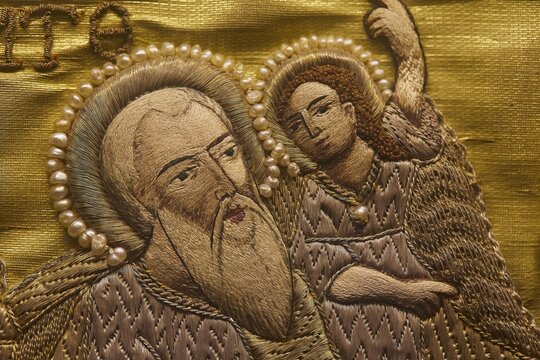 Detailed embroidery of a saint with pearl jewellery on golden fabric, Museum of Icon Painting, Thari Monastery, Moni Thari, near Gadouras Reservoir, lonely mountain region, Rhodes, Dodecanese, Greek Islands, Greece