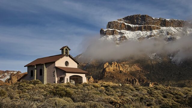 Ermita de las Nieves, small church in front of a mountain landscape with clouds, Teide, Parque Nacional del Teide, Teide National Park, volcano, volcanism, UNESCO World Heritage Site, Tenerife, Canary Islands, Spain