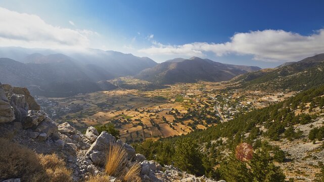 Sun-drenched valley with mountains and clouds in the background, Askifou plateau, Askifou, Sfakia, West Crete, Crete, Greece