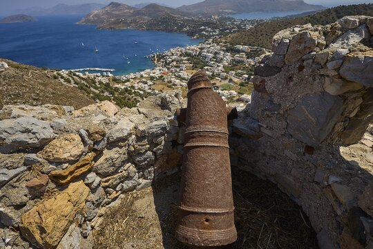 Old cannon on ruins overlooking the sea and surrounding landscape of hills, Pandeli Castle, Castle, Leros Fortress, St John's Fortress, Apitiki Hill, Pandeli Bay, Agia Marina, Leros, Dodecanese, Greek Islands, Greece