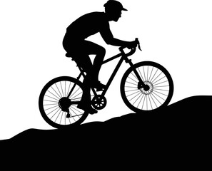 Fototapeta premium Silhouette of a person riding a bicycle on a hill side outdoors