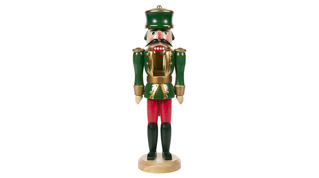 Traditional wooden nutcracker soldier with green uniform and red pants, isolated on transparent background
