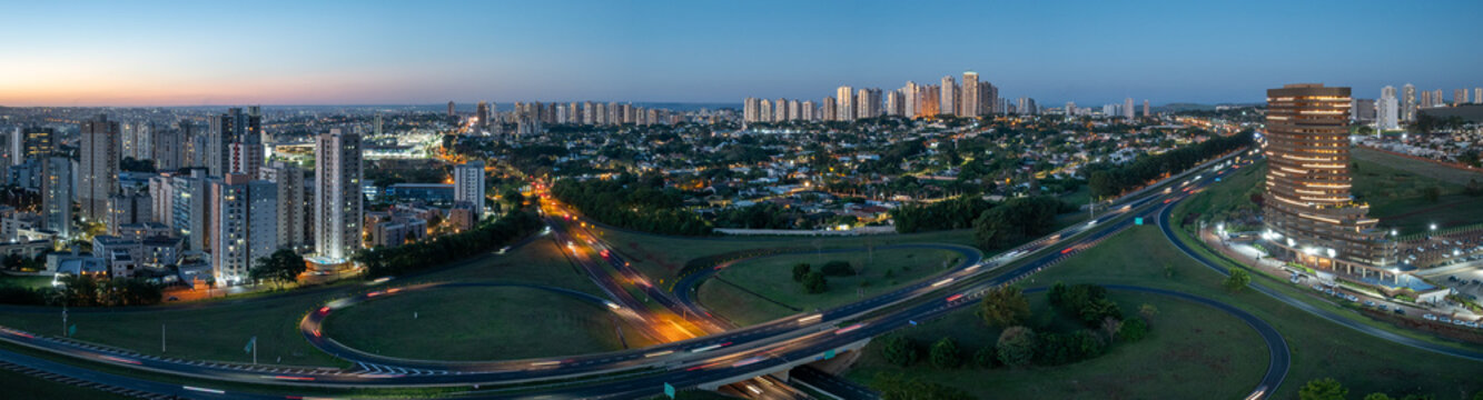 Aerial panorama of Anel Viario Sul highway interchange at dusk in Ribeirao Preto, Brazil