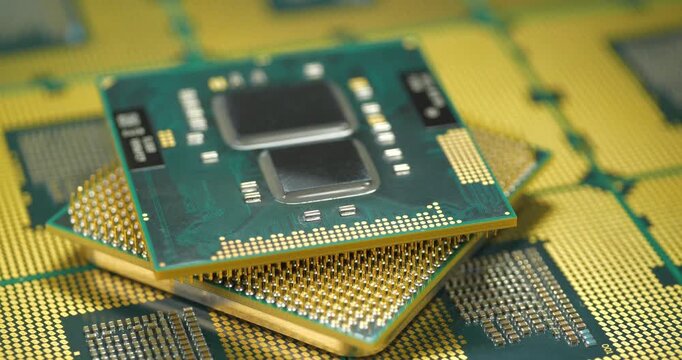 Central processing units with golden pins and contacts for a personal computer, essential for computing tasks