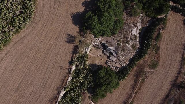 Naxar, Malta 01.07.2026 - Salini Catacombs aerial view of the field. This group of burials is situated in an area known as Ta&rsquo; Latnija. High quality 4k footage